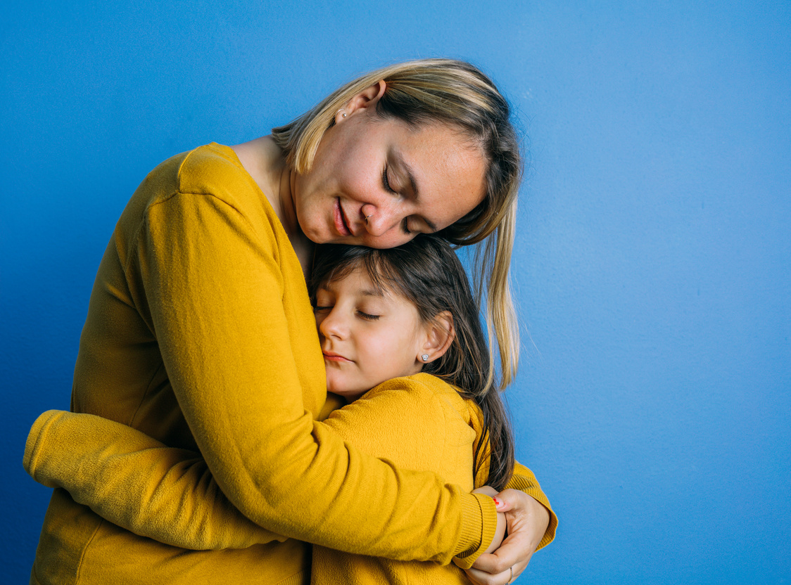 Mother and Daughter Hugging